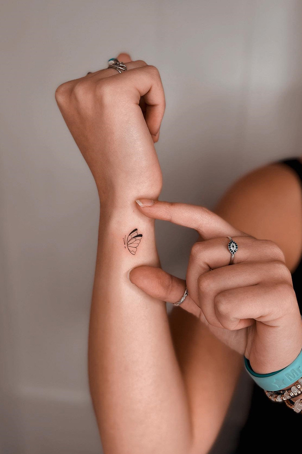 Tiny butterfly tattoo ideas on the wrist