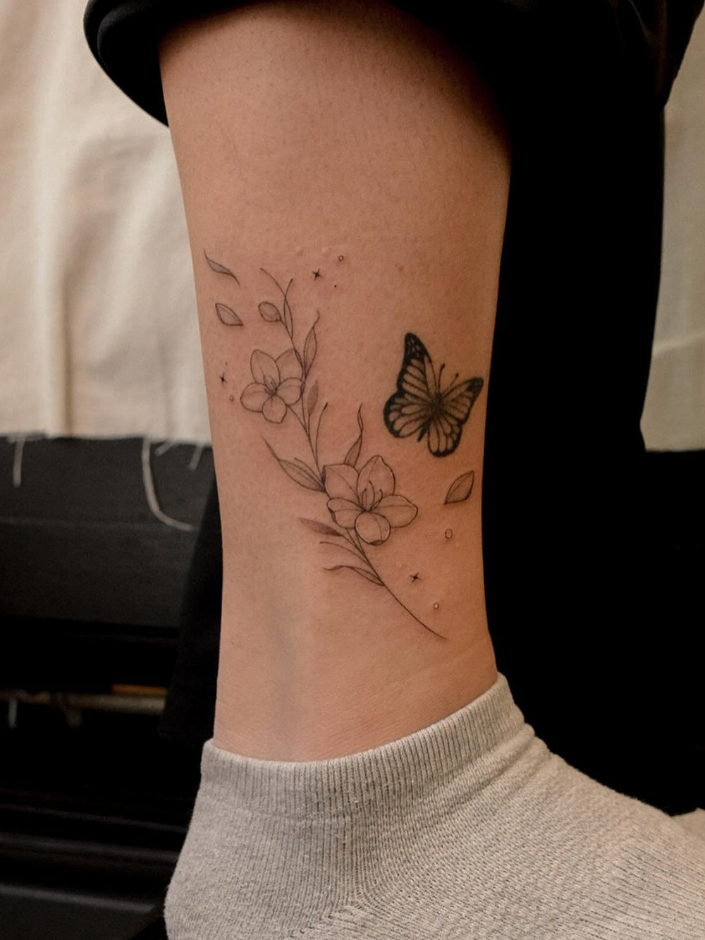 Floral and Butterfly Tattoo Designs on the Ankle