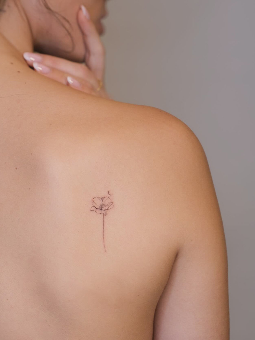 Cute and Small Poppy Tattoo