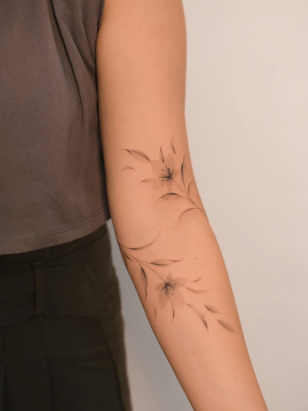 Delicate and Fine Line Flower Tattoo Ideas on Arm