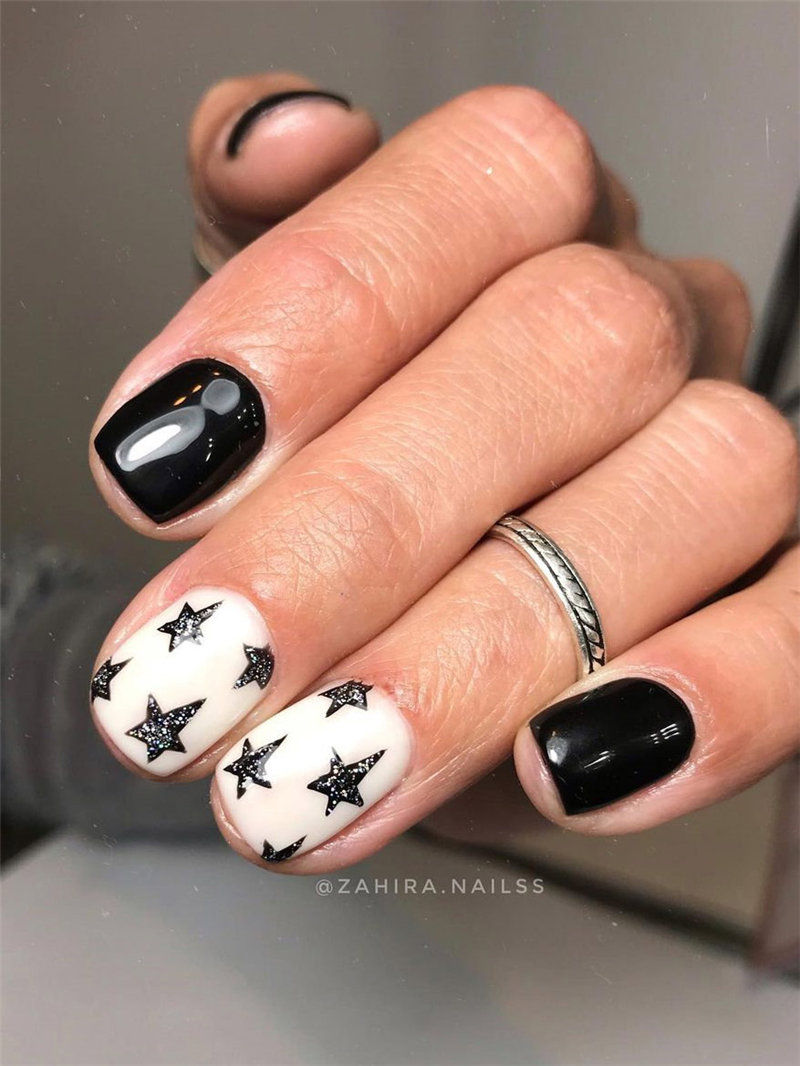 Black and White Nails With Glitter Stars