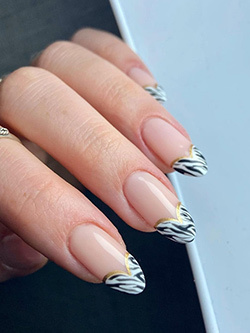 Zebra Print Hearts French Tips Nail Design