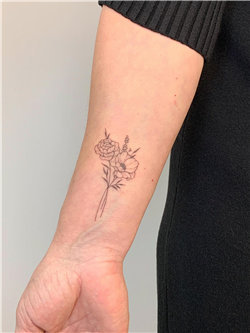 Delicate Floral Tattoo on Wrist for Women
